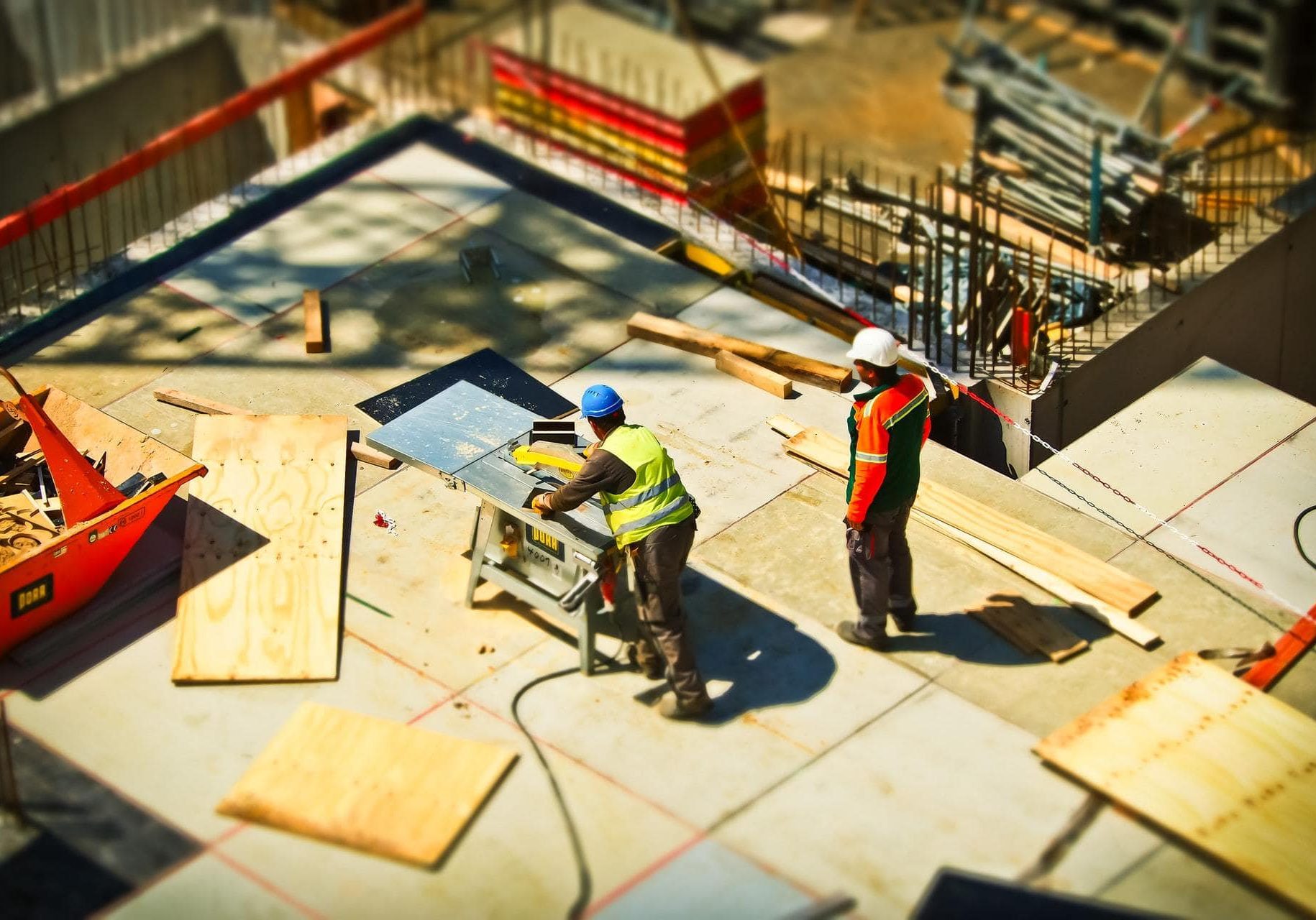 2-man-on-construction-site-during-daytime-159306